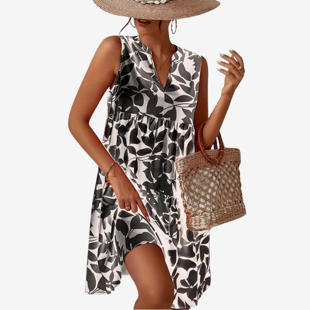 Daphne | stilvolles Midikleid, ausgestellter Schnitt, Blumendetails.