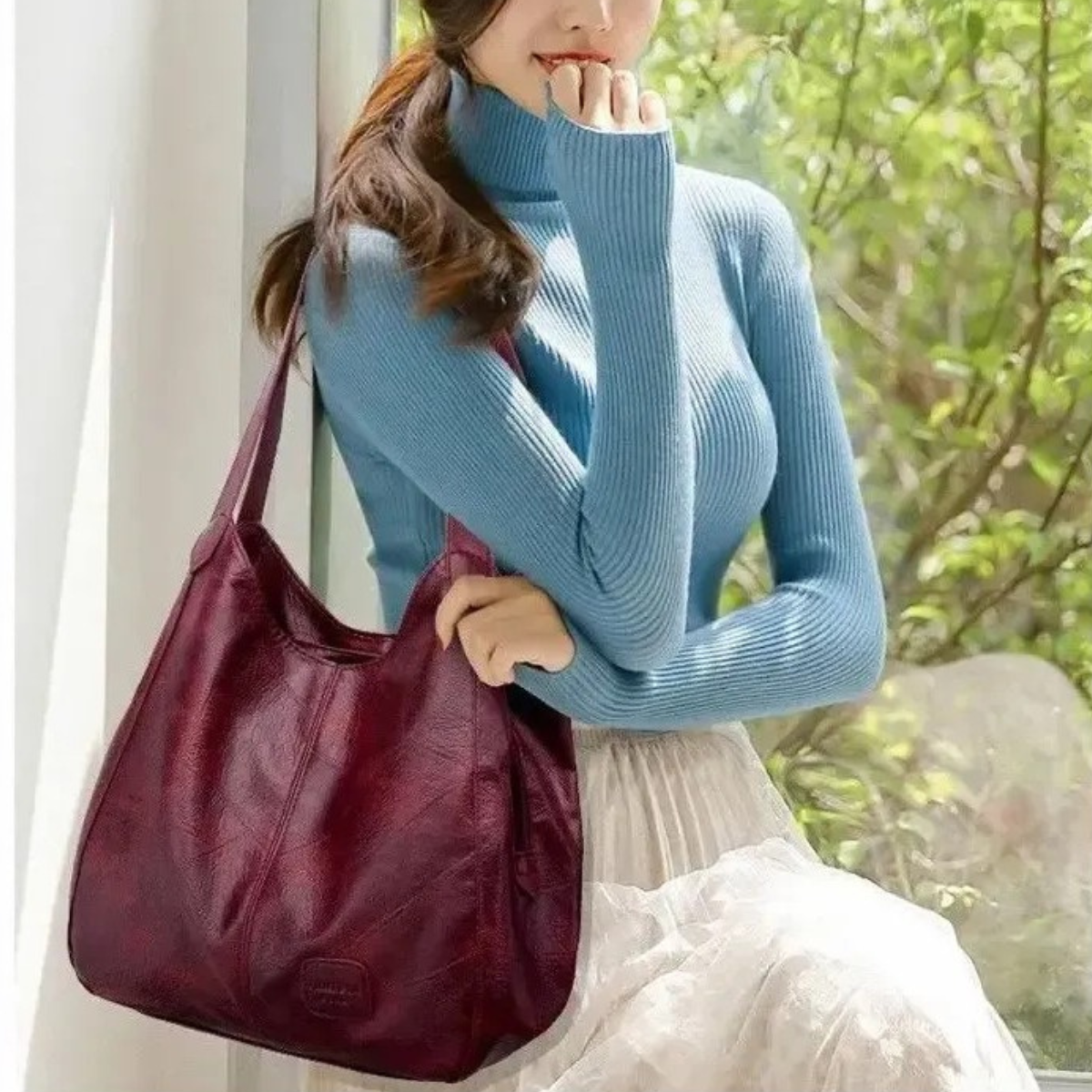 Betta | Schultertasche aus echtem Leder