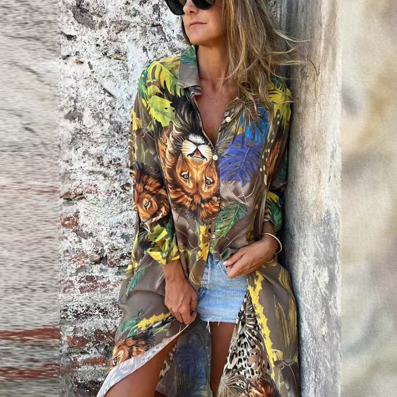 Precia | Elegantes langärmliges Kleid mit offenem Revers und floralem Print