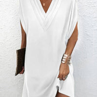 Estelle™ | Elegantes, einfarbiges Kleid mit geschlitzten Ärmeln