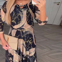 Dafne | stilvolles Kleid mit bedrucktem Taillendesign und dreiviertel Ärmeln