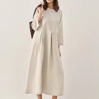 Ava | modisches Maxikleid aus Leinen mit tiefem Dekolleté und Falten