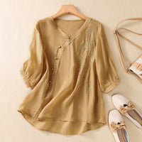 Lorry | Stylische Tunika mit innovativen asymmetrischen Knöpfen