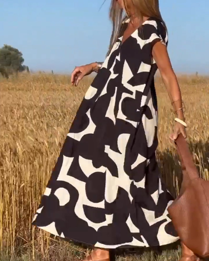 Dua | Bedrucktes Kleid mit V-Ausschnitt