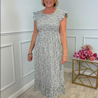 Zara | Elegante geblümte Damenkleider mit Rüschen