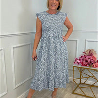 Zara | Elegante geblümte Damenkleider mit Rüschen