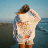 Merrit | Weicher Hoodie mit gesticktem Sonnenuntergang im Hintergrund