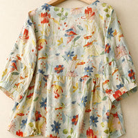 Tamia | Feminine Bluse mit floralen Akzenten und Naturstoffen