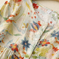 Tamia | Feminine Bluse mit floralen Akzenten und Naturstoffen