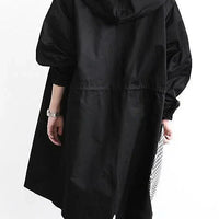 Eden | stylischer Mantel, weiter Schnitt, Kapuzendesign.