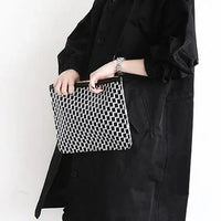 Eden | stylischer Mantel, weiter Schnitt, Kapuzendesign.