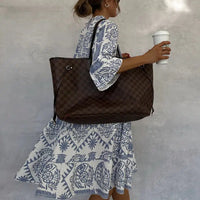 Heli | Blaues Minikleid mit V-Ausschnitt und Ärmeln