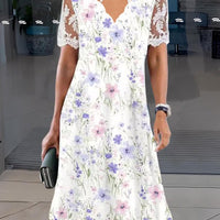 Jenice | Ätherisches Midikleid mit Blumendruck und transparenten Ärmeln