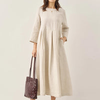 Ava | modisches Maxikleid aus Leinen mit tiefem Dekolleté und Falten