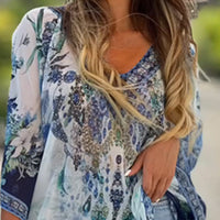 Asiarra | Feminines Kleid mit asymmetrischem Design und V-Ausschnitt