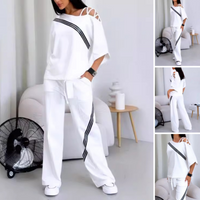 Thea | Bequemes zweiteiliges Set mit kurzärmeligem Oberteil und gestreifter Hose