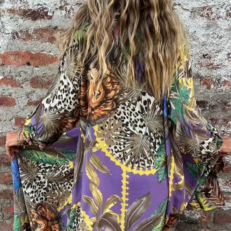 Precia | Elegantes langärmliges Kleid mit offenem Revers und floralem Print