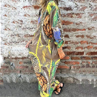 Precia | Elegantes langärmliges Kleid mit offenem Revers und floralem Print