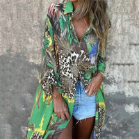 Precia | Elegantes langärmliges Kleid mit offenem Revers und floralem Print