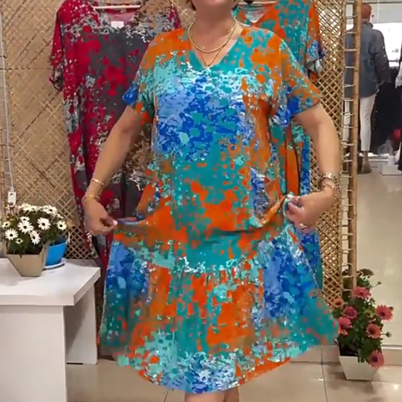 Micha | Midikleid mit V-Ausschnitt und lebhaftem abstraktem Muster